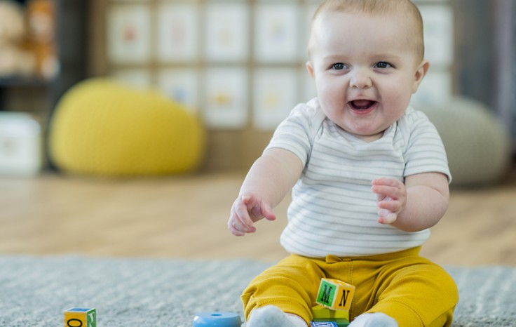 Baby Playing with Blocks