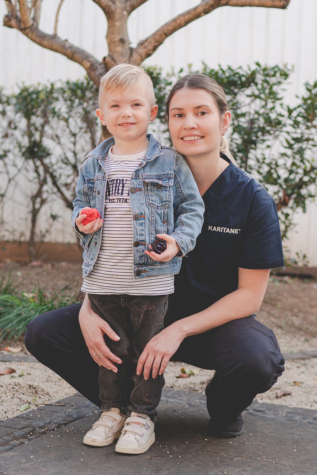 A Karitane worker with a young boy